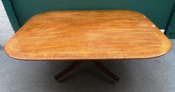 A George III mahogany rectangular snap top centre table, on four downswept supports, reduced, 118cm wide x 156cm long x 55cm high.
