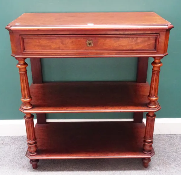 An early 19th century French mahogany three tier buffet, with single drawer on fluted supports, 89cm wide x 99cm high x 44cm deep.