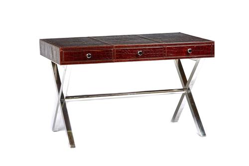 Attributed to Andrew Martin; a 20th century desk, with faux crocodile top and three drawers, on chrome 'X' frame supports, 121cm wide x 74cm high x 71