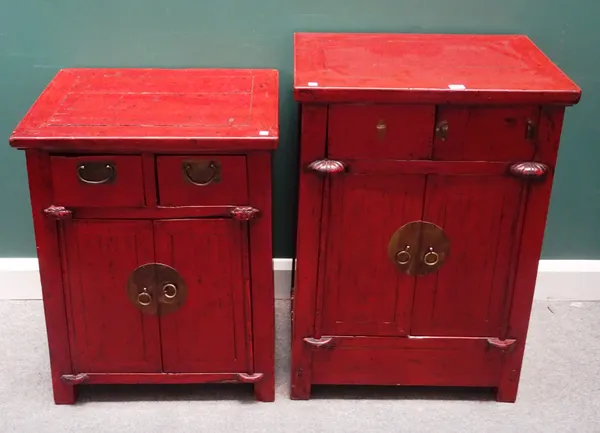 An early 20th century Chinese scarlet lacquered side cabinet, with pair of drawers over cupboard, on block feet, 59cm wide x 76cm high x 46cm deep, to