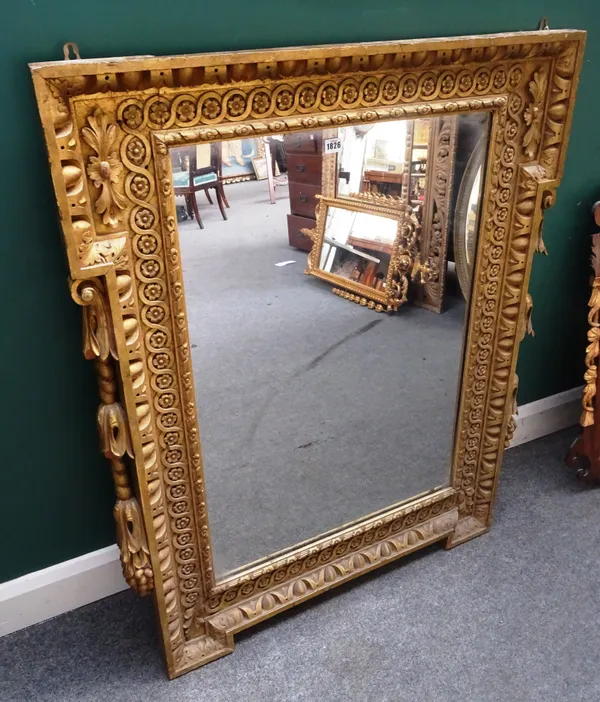 A George II style gilt framed stepped rectangular mirror, with egg and dart and floral moulded frame, 95cm wide x 116cm high,