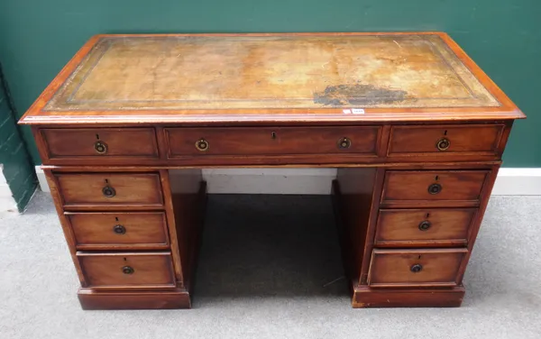 A late 19th century mahogany pedestal desk, with nine drawers about the knee, on plinth base, 139cm wide x 70cm deep x 80cm high.    Note that this de