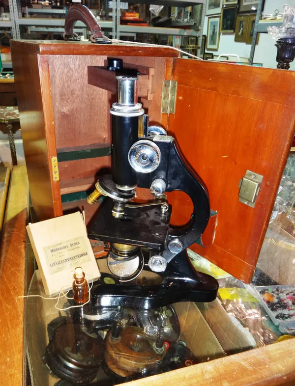 Precision 1382 Flatters & Garnett Ltd, Manchester; An early 20th century cased microscope and slides. CAB