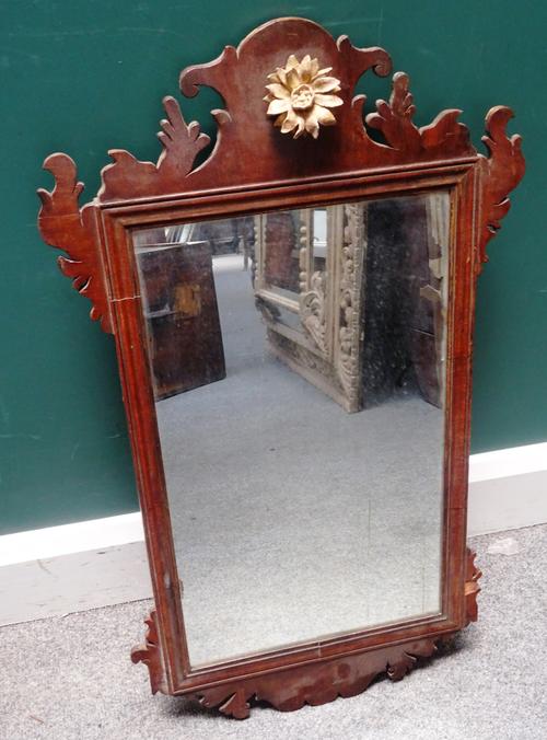 A George III walnut fret carved pier glass, 46cm wide x 90cm high, together with an early 19th century galleried single door night stand, on tapering