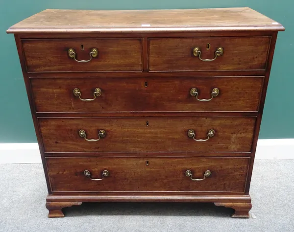 A George III mahogany chest of two short and three long graduated drawers, on ogee bracket feet, 105cm wide x 96cm high x 53cm deep.