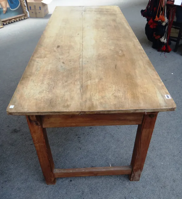 A 19th century beech and pine baker's table, the twin plank top lifting to reveal a slatted bread proving undertier, on block supports, 77cm wide x 20