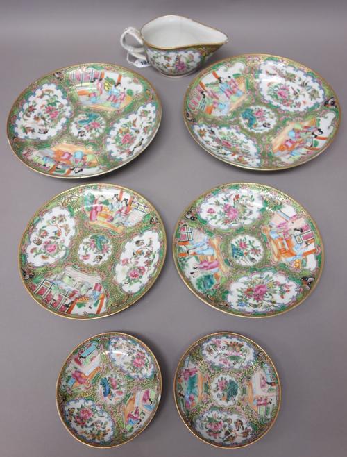 A Canton famille-rose composite service, 19th century, each piece painted with panels of figures, birds and flowers, comprising; six shallow bowls, 25