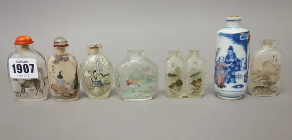 A group of six Chinese inside painted glass snuff bottles, 20th century, various subjects, tallest 6.5cm. high; and a porcelain cylindrical snuff bott