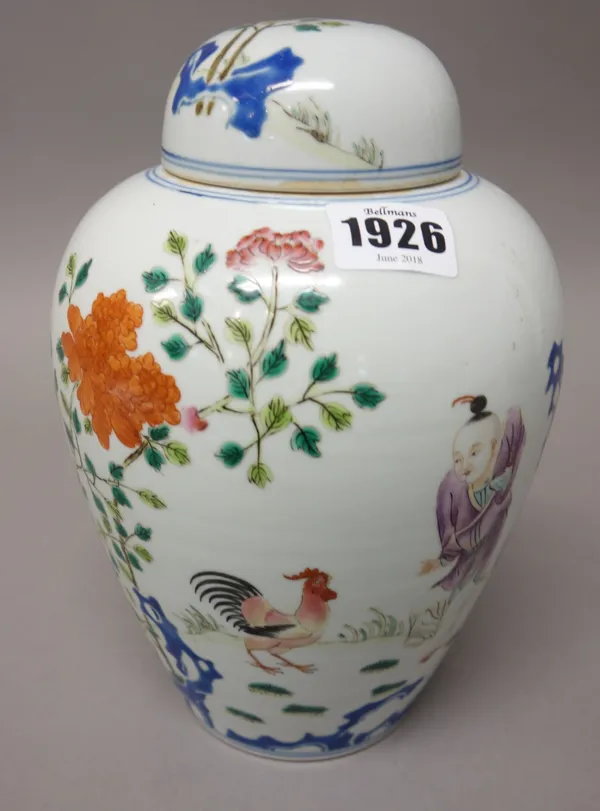 A Chinese famille-rose ovoid vase and cover, painted with a boy with a cockerel amongst flowers, the reverse with calligraphy, apocryphal Qianlong sea