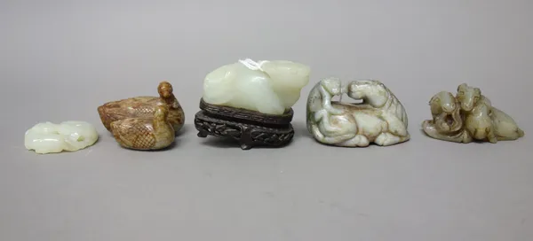 A group of six Chinese jade animal or bird carvings, of various tones, including a group of a recumbent horse and monkey, sizes 3.75cm. to 6.5cm. leng