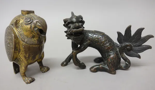 A Chinese gilt-bronze water dropper, Ming Dynasty, cast as a mythical bird standing with beak open, 10.5cm. high; also a small bronze model of a mythi