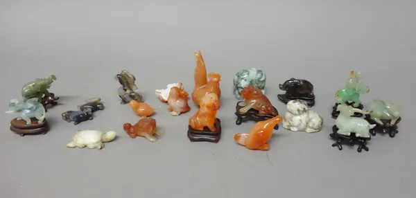 A group of twenty six Chinese hardstone small carvings of animals and birds, 20th century, including jade and agate, sizes approx. 3cm. to 7cm. high,