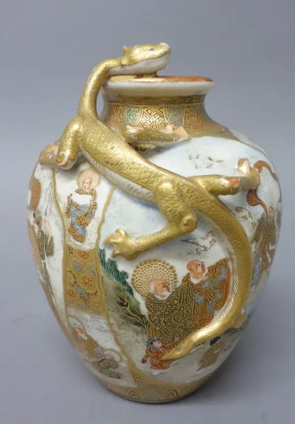 A Japanese Satsuma ovoid vase, Meiji period, painted with panels of figures including rakan and Kannon, the shoulders encircled by a chilong, signed,