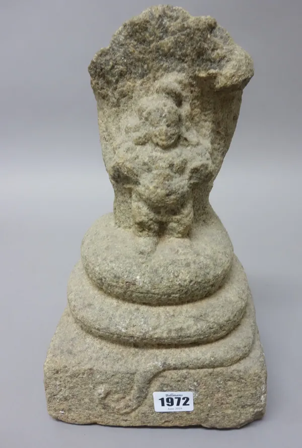 A group of Indian stone carvings comprising; two groups of Buddha seated before an aureole on a stepped mound base, 22cm. and 34cm. high; a stone tors