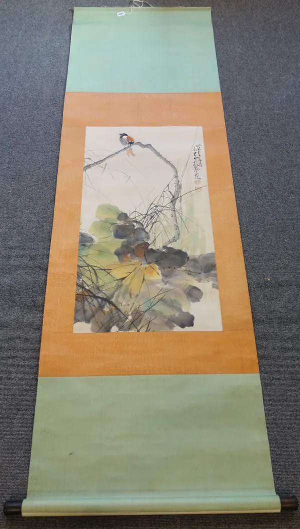 A Chinese scroll picture bearing the signature Zhao Shaoang, 20th century, depicting a bird in a branch above flowers, signed and with two red seals,