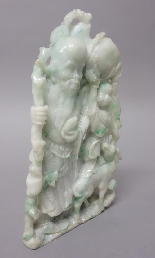 A Chinese jadeite group, 20th century, carved as Shou Lao next to a boy who stands on the back of a deer, 22cm. high; and a Chinese export mandarin pa