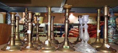 Collectables, including; a group of sixteen 18th century and later bronze and brass circular based candlesticks, (16).   S3T
