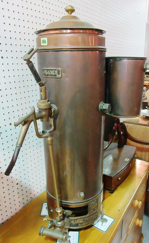 Maxol Heaters Manchester; an early 20th century brass water urn, 60cm wide x 75cm high.   F9