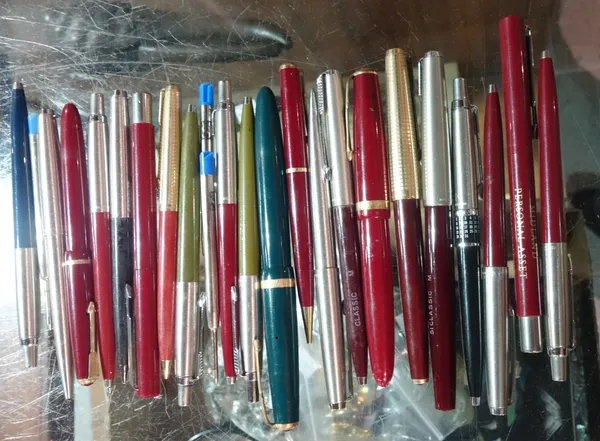 A quantity of Parker ballpoint and fountain pens, (qty).   CAB