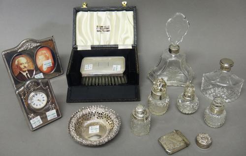 Silver and silver mounted wares, comprising; a Victorian bonbon dish, with embossed and pierced decoration, Chester 1897, a vesta case, Birmingham 189