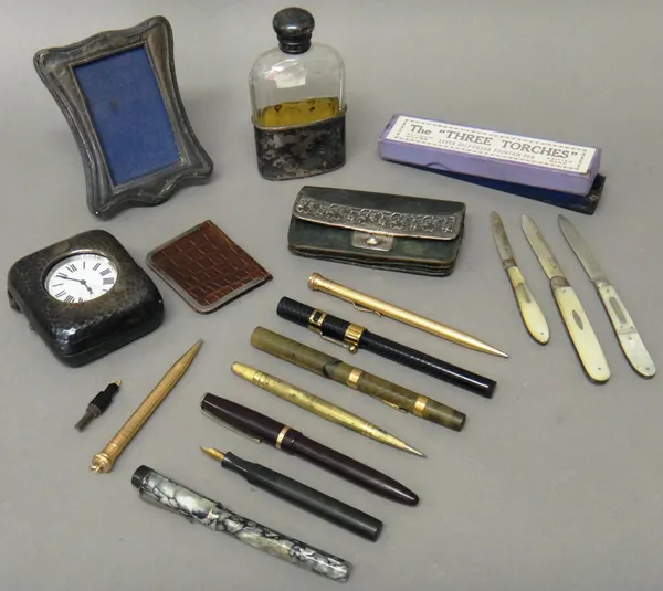 A silver fronted rectangular travelling pocket watch case, London 1904, a base metal cased, keyless wind open faced pocket watch, a silver topped face