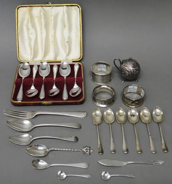 Silver, comprising; a set of six teaspoons, Sheffield 1957, with a case, three napkin rings, a butter knife, a fork, six similar rat tail pattern coff