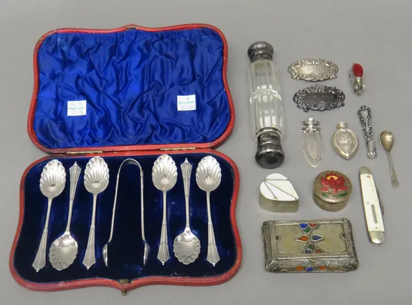 A Victorian set of six silver teaspoons, with a matching pair of silver sugar tongs, London 1896, with a case, two silver decanter labels, detailed Gi