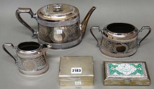 A silver mounted table cigarette box, wooden lined within, London 1927, a Persian rectangular hinge lidded case, the lid decorated with an enamelled p