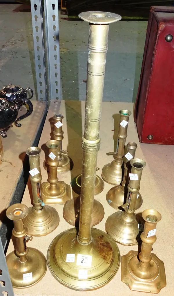 Collectables, including; a group of  eleven 18th century and later bronze and brass ejector candlesticks, (11).  S3B