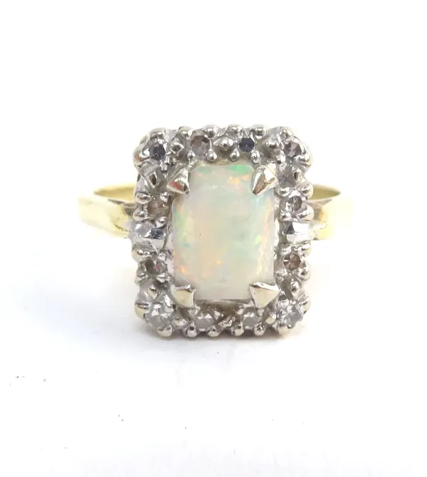 A gold, opal and diamond rectangular cluster ring, claw set with the opal at the centre, within a surround of circular cut diamonds, ring size M and a