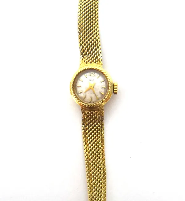 A gold lady's bracelet wristwatch, with an unsigned jewelled movement, on a gold woven mesh link bracelet, with a foldover clasp, detailed 0750, gross