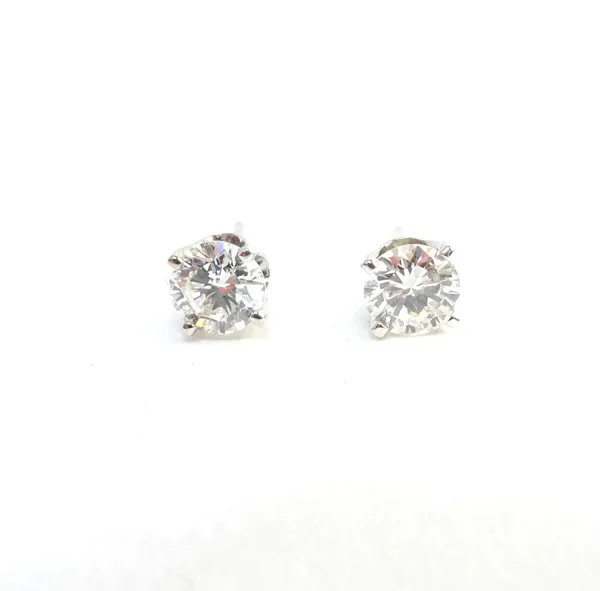 A pair of diamond set single stone earstuds, each claw set with a circular cut diamond, detailed to the butterfly clips 14 KT and with another pair of