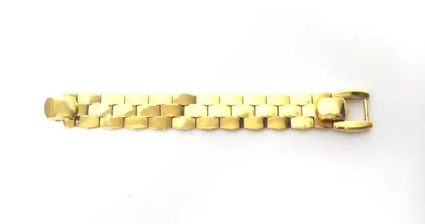 A gold bracelet, in a three row curved panel shaped link design, with a foldover clasp, detailed 18 KT Italy, length 17cm, gross weight 44 gms.