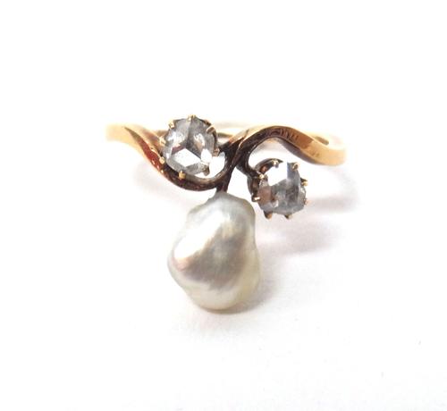 A gold, rose diamond and freshwater cultured pearl ring, mounted with a freshwater cultured pearl to the centre, between two rose cut diamonds, in a s