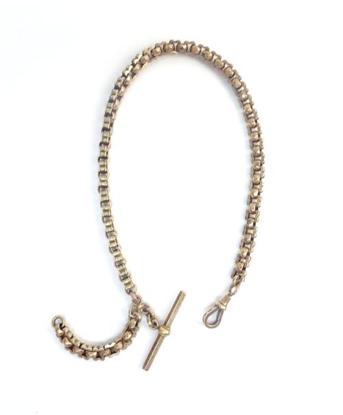 A Victorian faceted circular and shaped square link watch Albert chain, fitted with a hexagonal T bar and with a gold swivel, detailed 9 C, gross weig