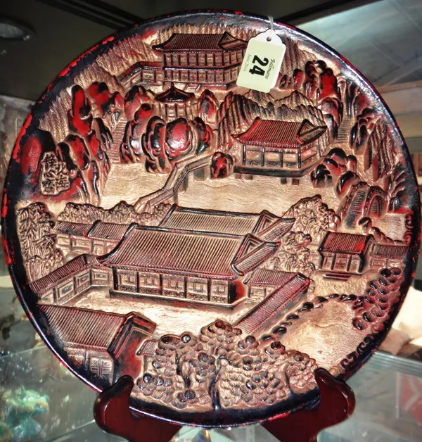 A Chinese circular lacquered wood landscape panel, 25cm. diameter. 3968   CAB