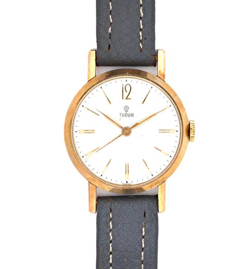 A Tudor 9ct gold circular cased gentleman's wristwatch, the signed circular silvered dial with gilt baton numerals, Arabic at 12 o'clock, on a leather