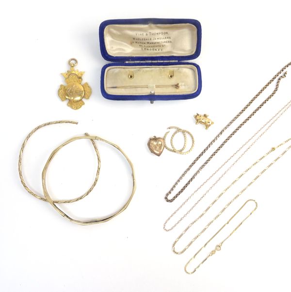 A group of mostly 9ct gold jewellery, comprising; a pendant fob medallion, with floral engraved decoration, engraved to the back Duchess of Bedford's