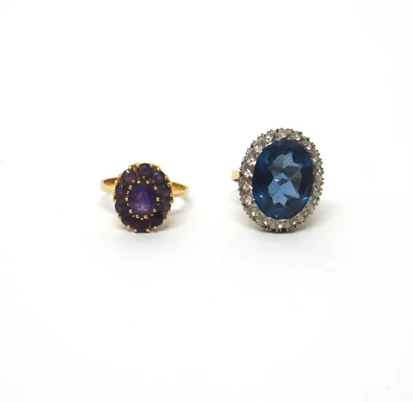 A gold and amethyst set oval cluster ring, ring size O and a half and a gold, synthetic blue gem and colourless gem set oval cluster ring, detailed K