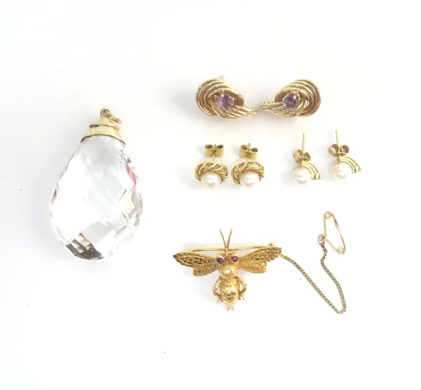 A 9ct gold brooch, designed as a winged insect, having cabochon ruby eyes, London 1973, fitted with a safety chain, a pair of 9ct gold and amethyst se