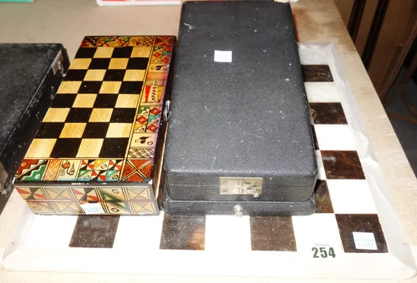 A 20th century marble chess set and board, with further chess pieces.   S1M