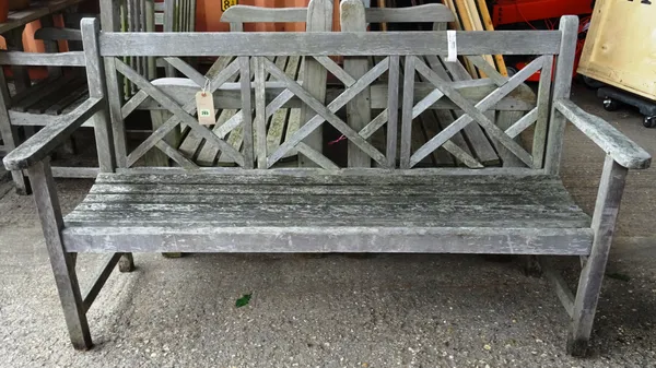 A similar pair of 20th century teak garden benches with angular backs, 150cm wide (2).  OUT