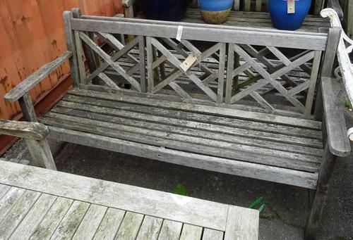 A similar pair of 20th century teak garden benches with angular backs, 150cm wide (2). OUT