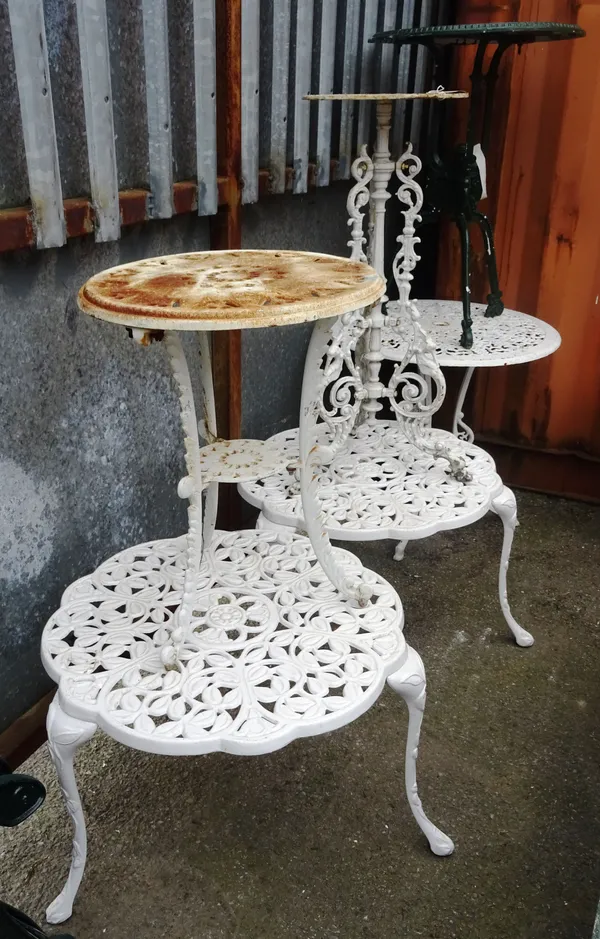 A group of six small 20th century painted metal garden tables, the largest 65cm wide, (6).  OUT