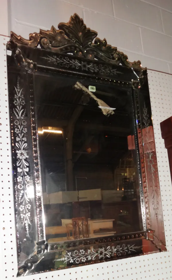 A 20th century etched glass Venetian mirror, 72cm wide x 120cm high, a floral painted arch top mirror, 65cm wide and a circular barbola mirror, 29cm w