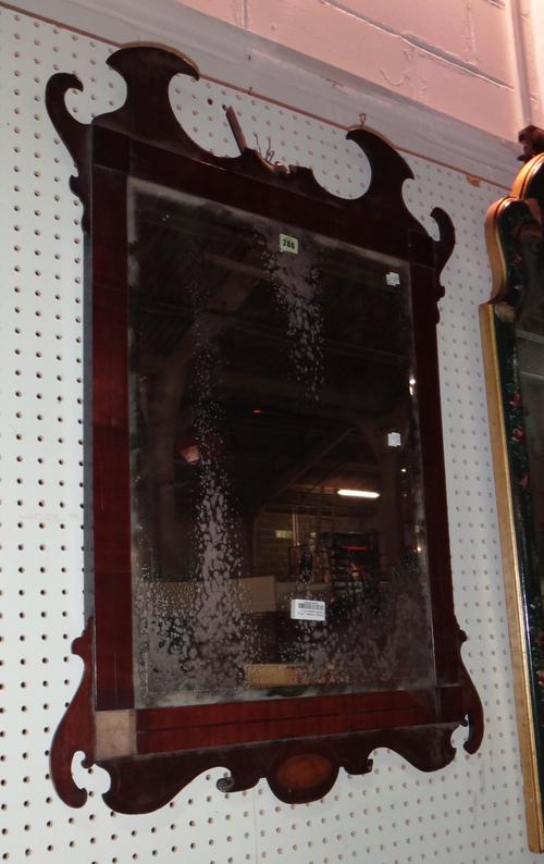 An early 19th century mahogany fret cut pier glass, 71cm wide and another similar smaller, 52cm wide, (2).  I6