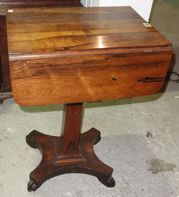A William IV rosewood drop flap work table, on quatrefoil base, 38cm wide x 70cm high.  J5