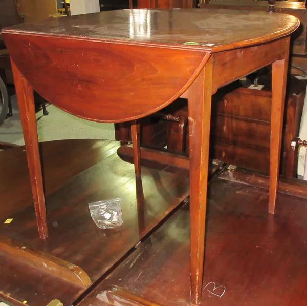 A George III mahogany Pembroke table, on tapering square supports, 61cm wide x 70cm high. H6