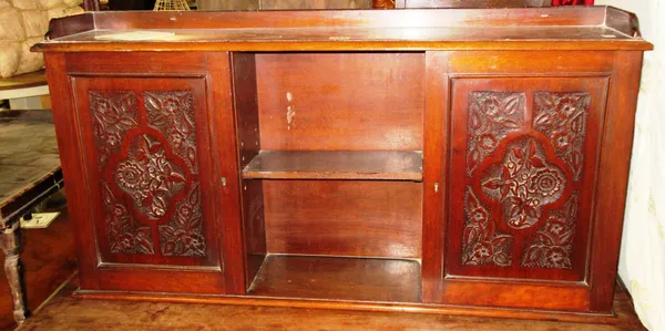 A 19th century mahogany hanging cupboard, with inset carved panelled doors, 95cm wide x 50cm high, and a 20th century mahogany folding lap table, 68cm