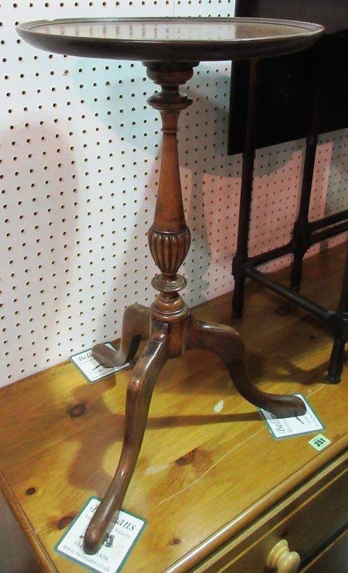 A George III style mahogany circular tripod table, 37cm wide x 64cm high, and an early 20th century floral painted occasional table, 47cm wide x 50cm
